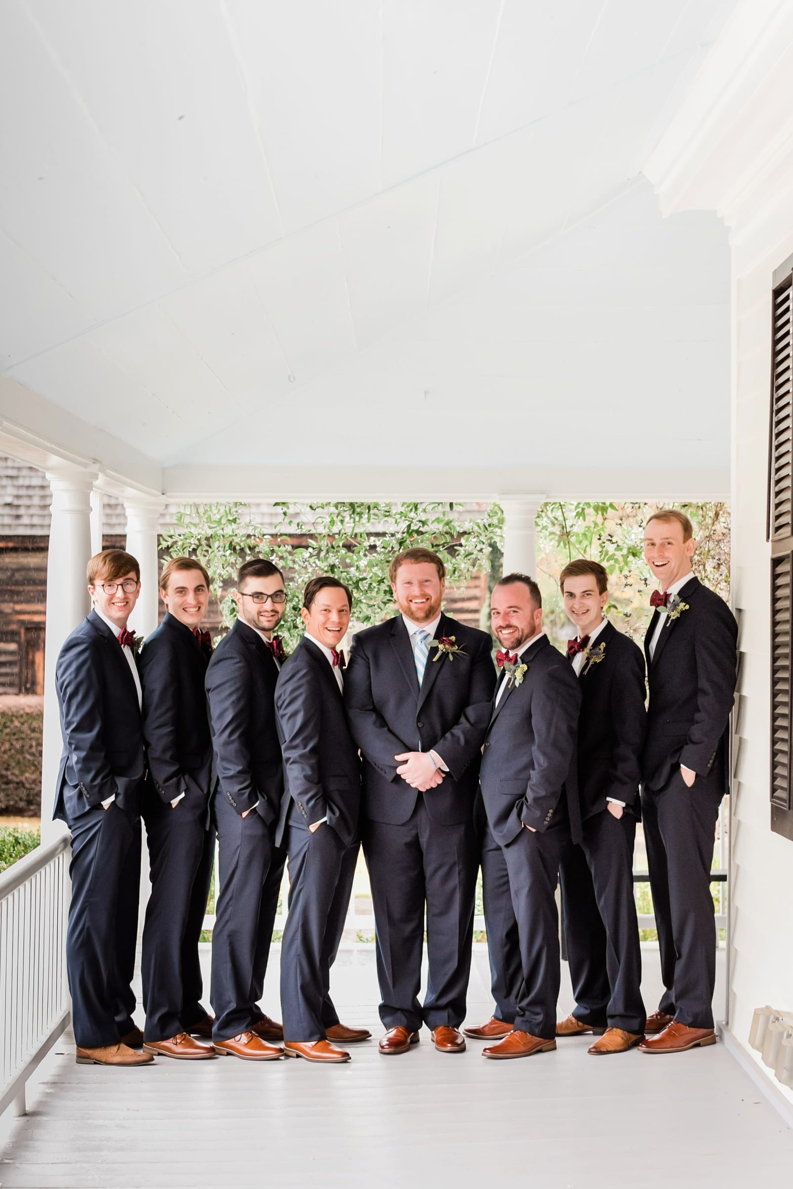 Sutherland Estate groomsmen with the groom on the front porch photo
