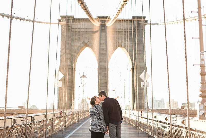 Brooklyn Bridge NYC Engagement photographer kissing Photo