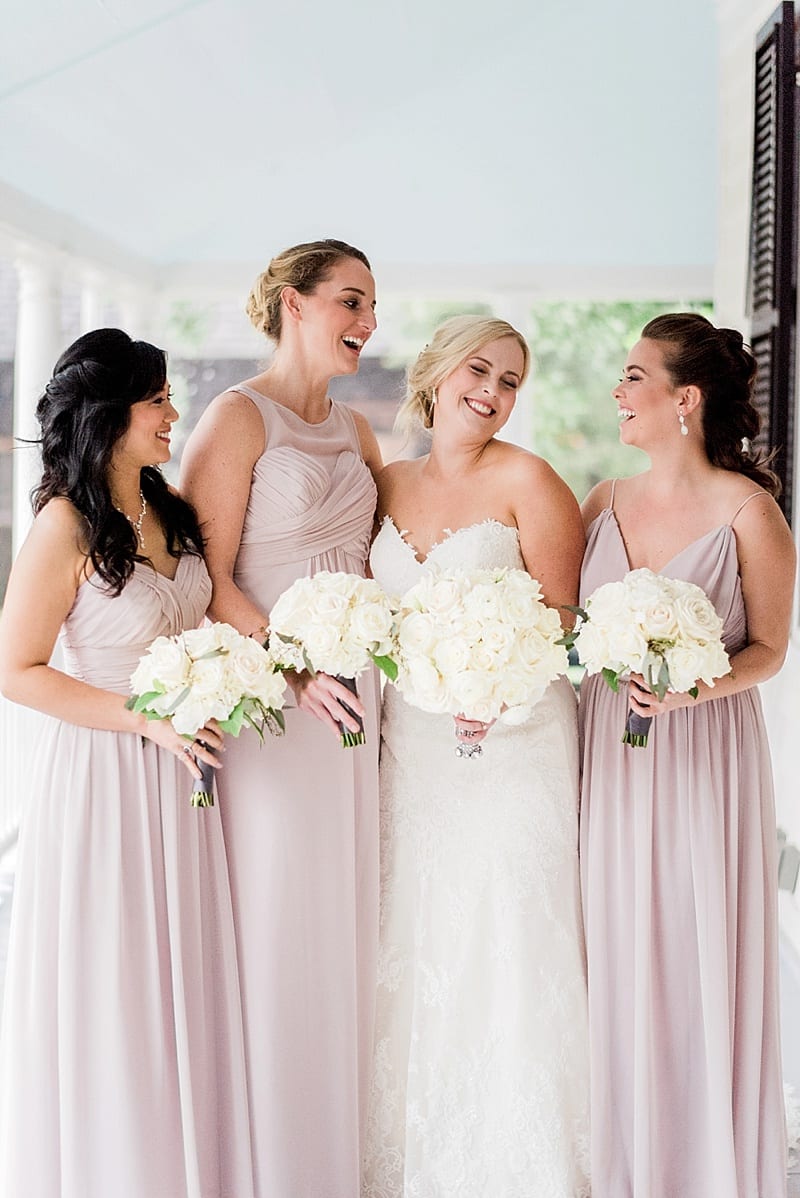 bridesmaids in long blush gowns photo