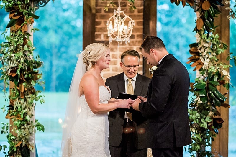 bride and groom crying during ceremony photo