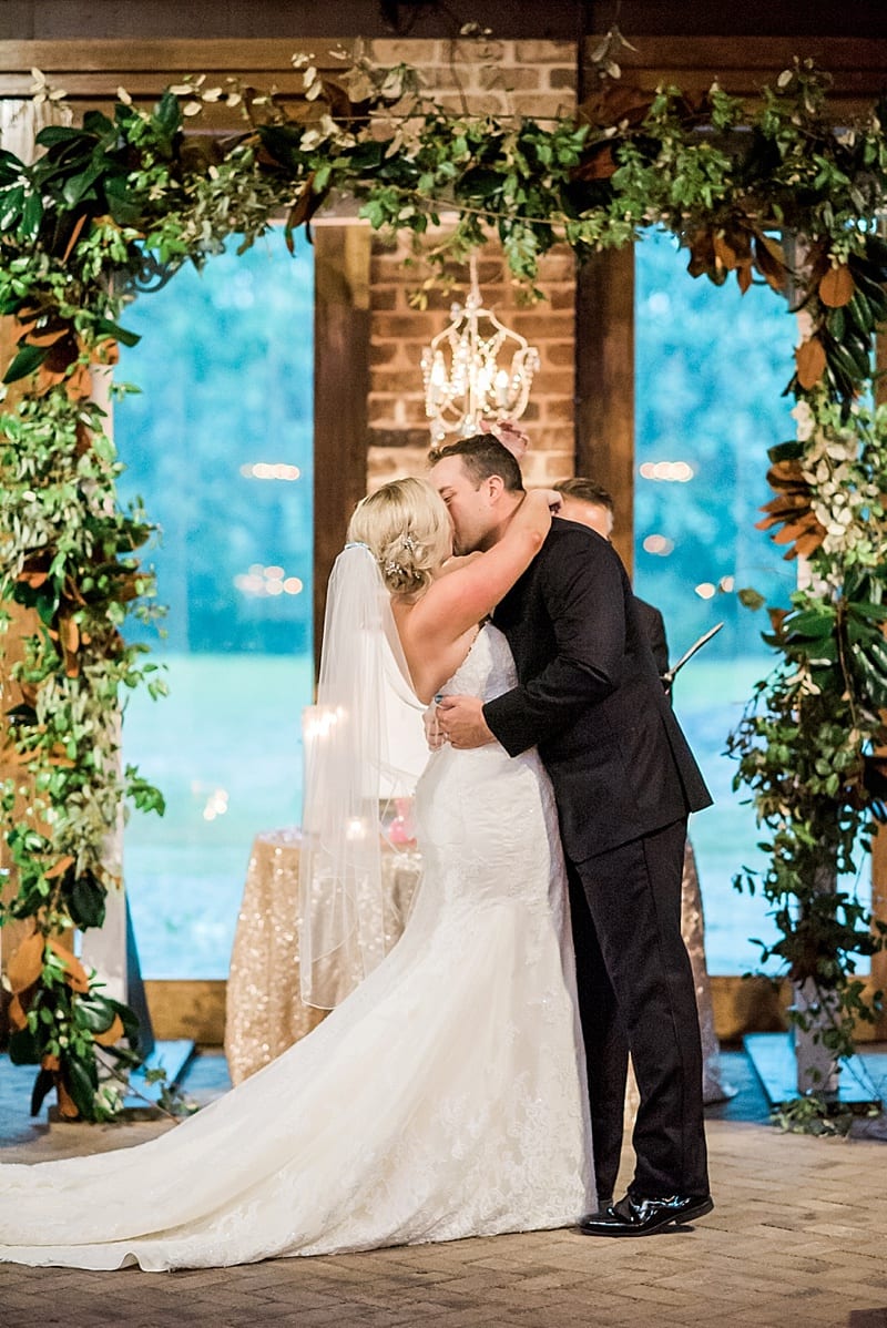 sutherland wedding indoor ceremony first kiss photo