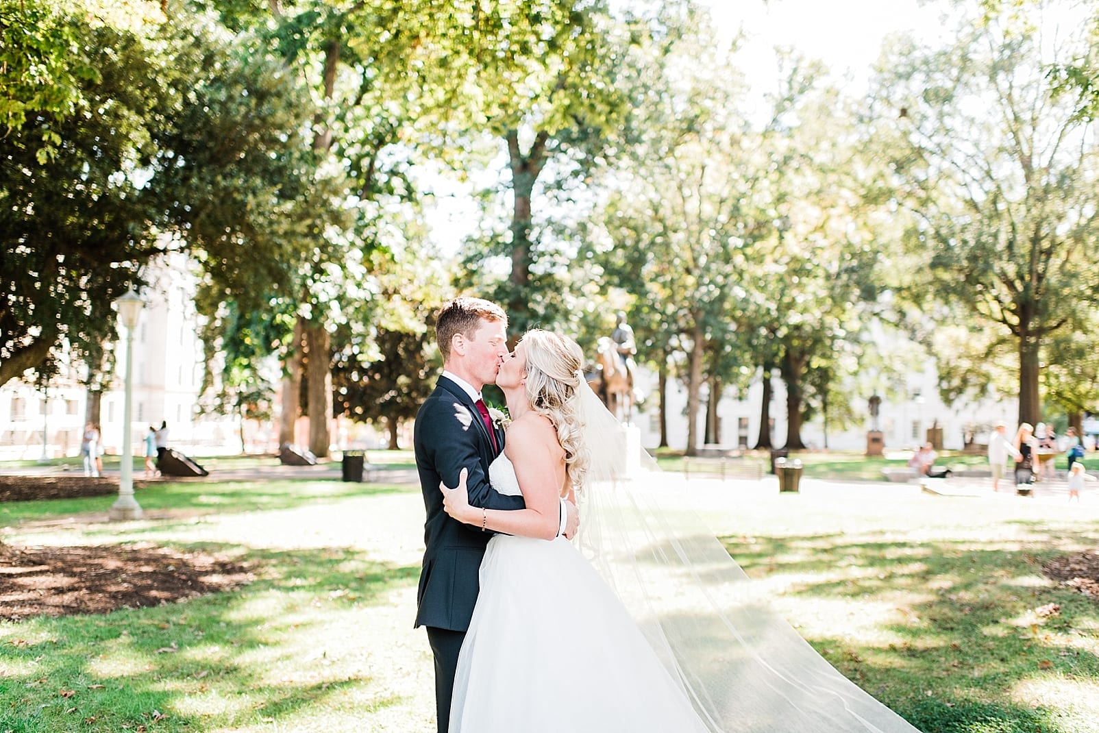 downtown raleigh wedding photographer bride and groom capitol building photo