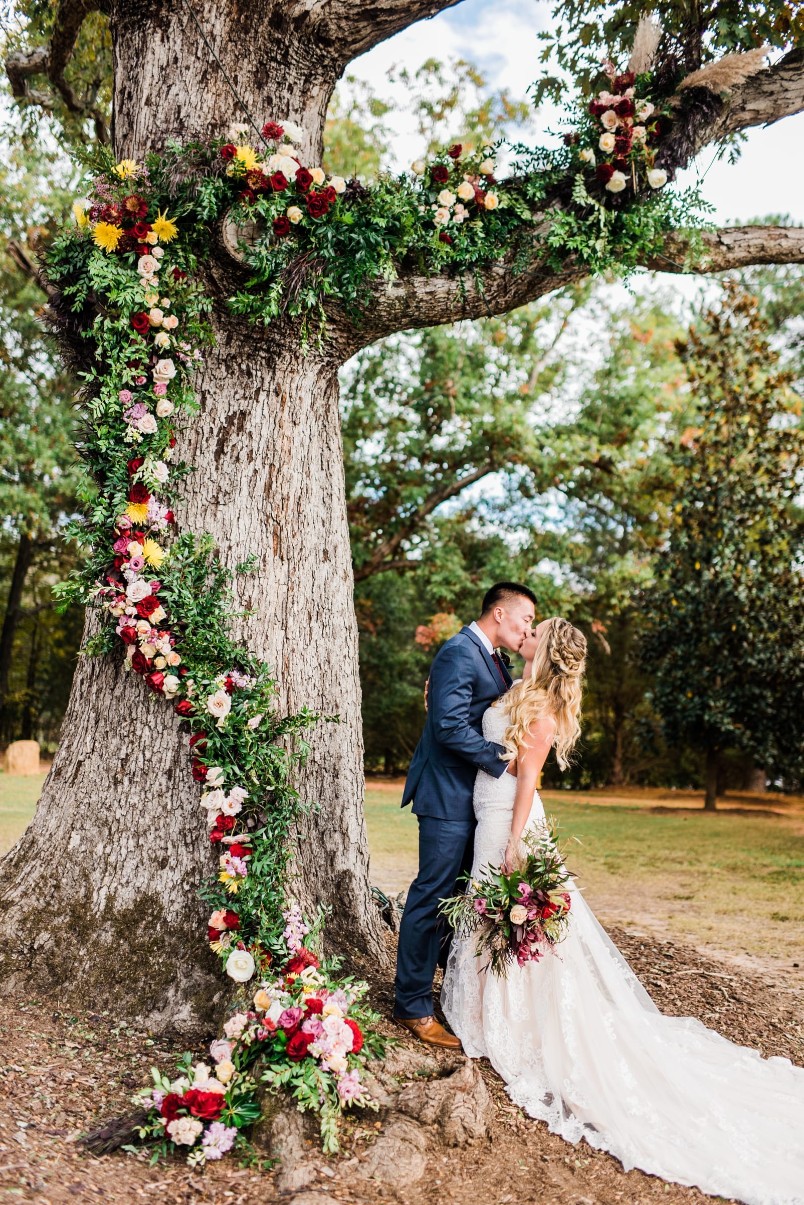 sutherland estate wedding photography floral garland on tree florals on tree specialties florals and events photo