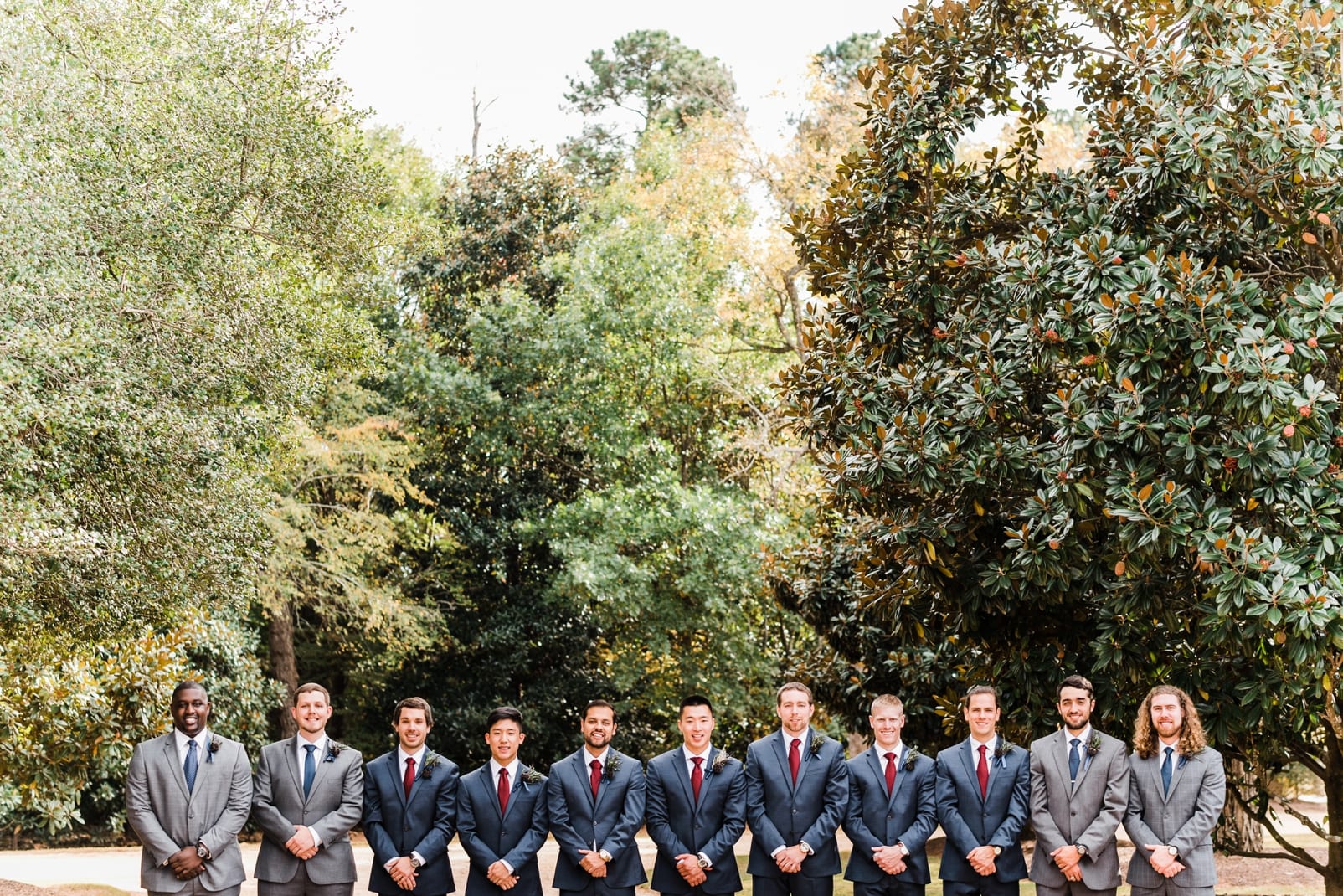 sutherland estate wedding photographer navy and burgundy wedding groomsmen in navy burgundy tie photo