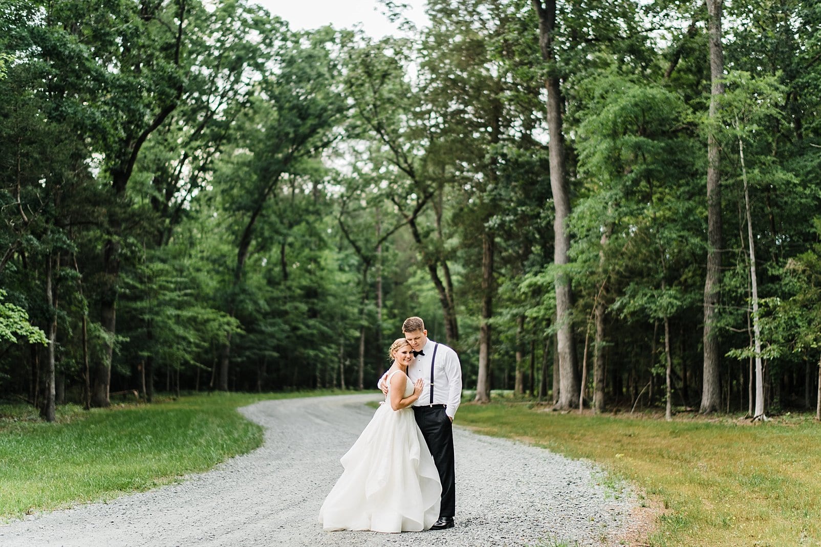 chapel hill wedding bride and groom on gravel road photo