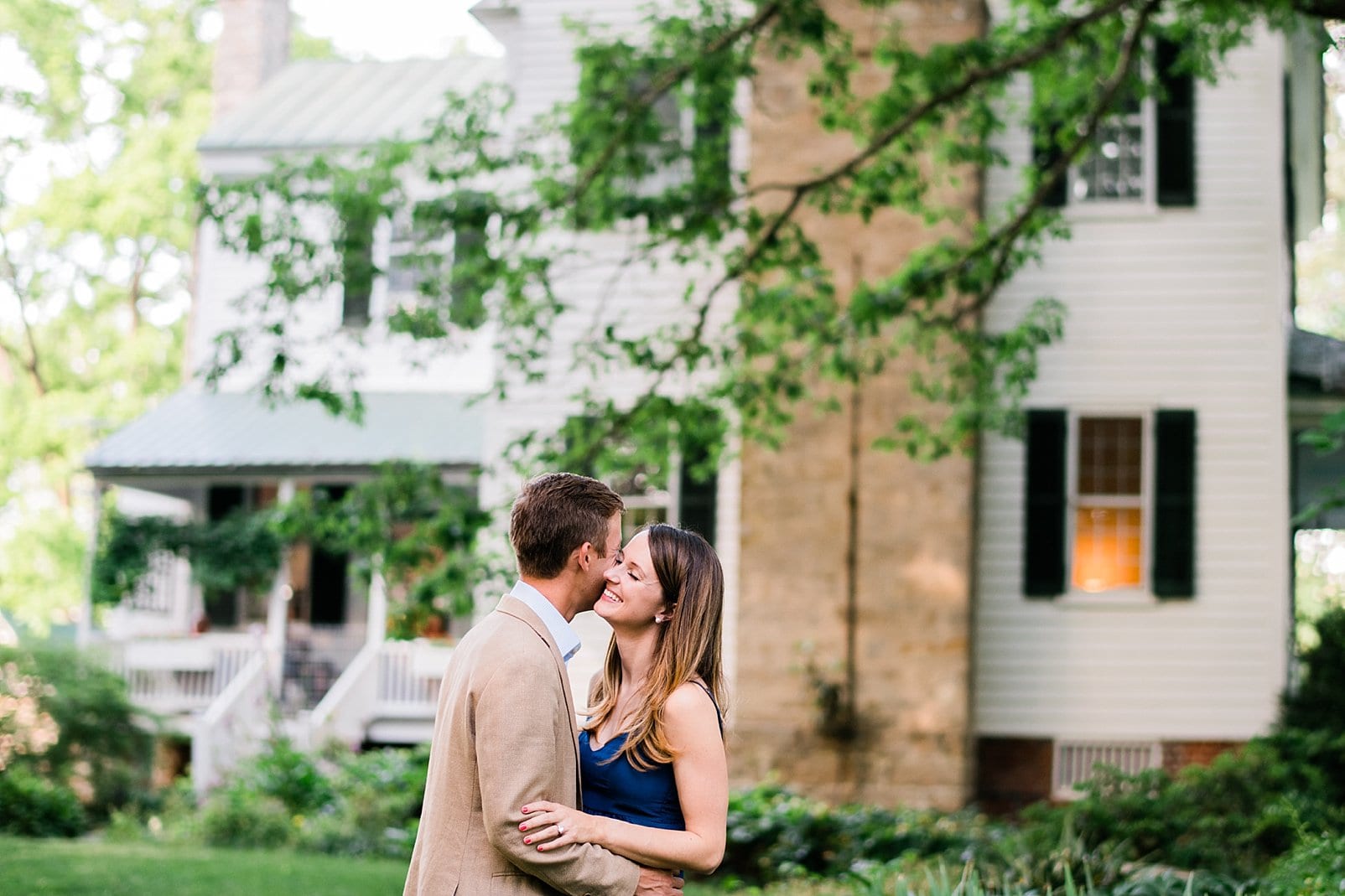 Private estate engagement session in front of childhood home photo
