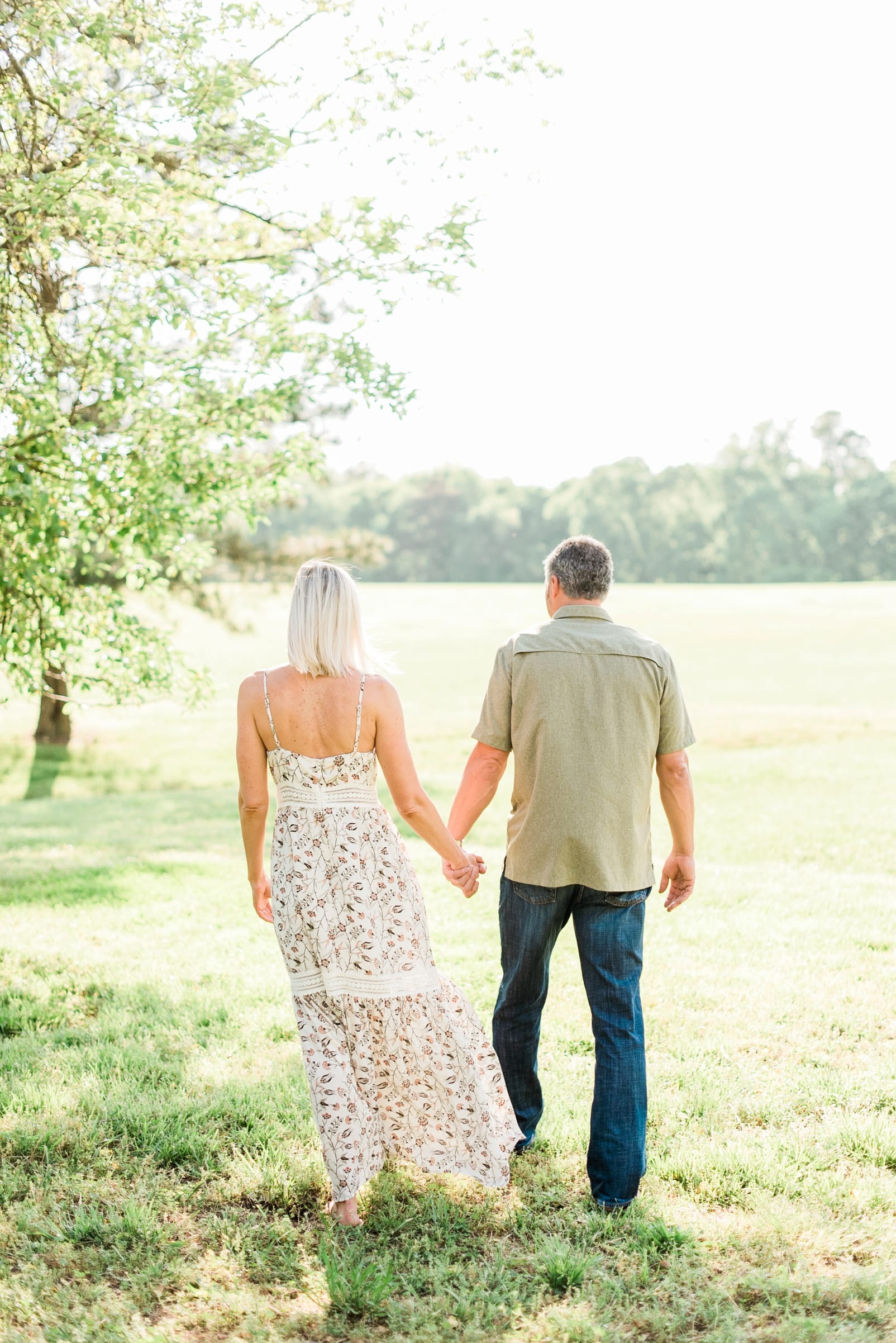 Wake Forest couple walking and holding hands photo