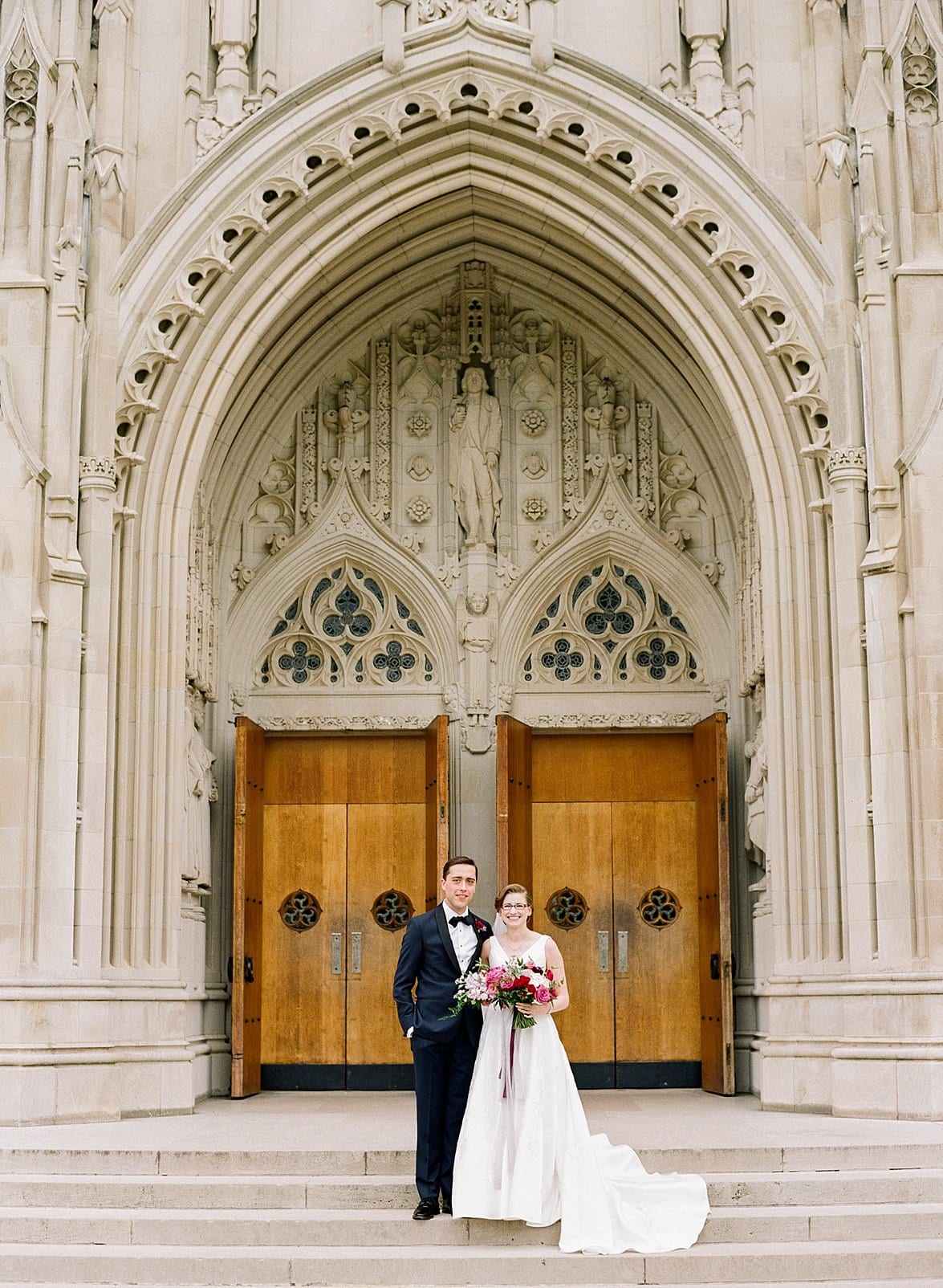 Duke Chapel bride and groom standing on the front steps of the church photo