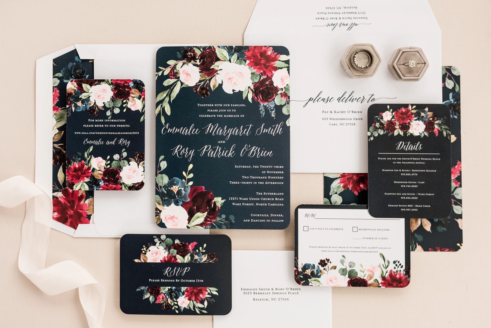 Shutterfly wedding invitation suite black background with white script and deep red and light pink floral decorations in the corner photo